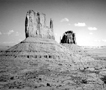 Black and white photograph of twin buttes, Navajo Indian Reservation, Monument Valley, Utah, architectural and landscape photography by Tony Sanders